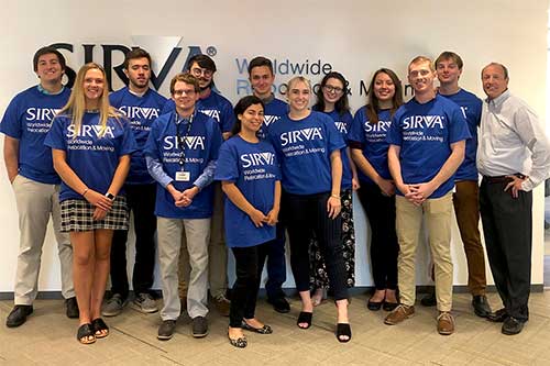SIRVA interns and temp collabrating together