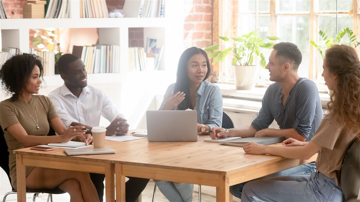 People talking at a table